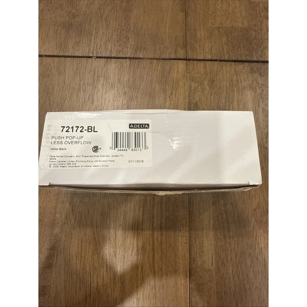 NEW Delta 72172-BL Push Pop-Up Less Overflow Matte Black